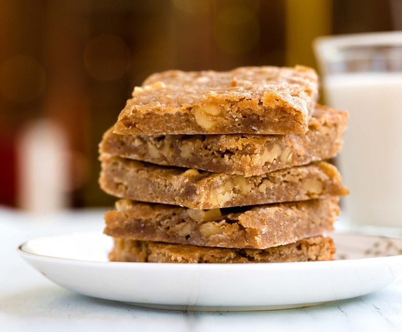 Stack of vegan salted caramel cafe blondies